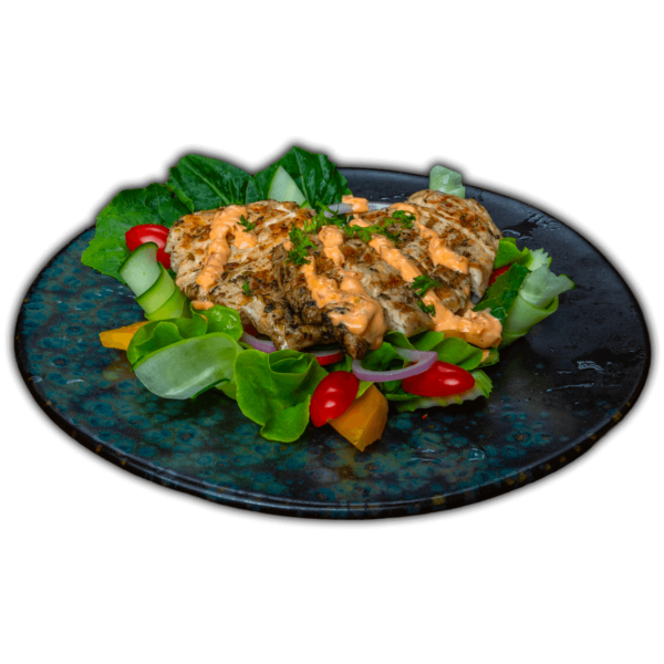 Grilled chicken breast on salad, served at Big Boys’ Burger Club in Kamala, Patong and Rawai Beach