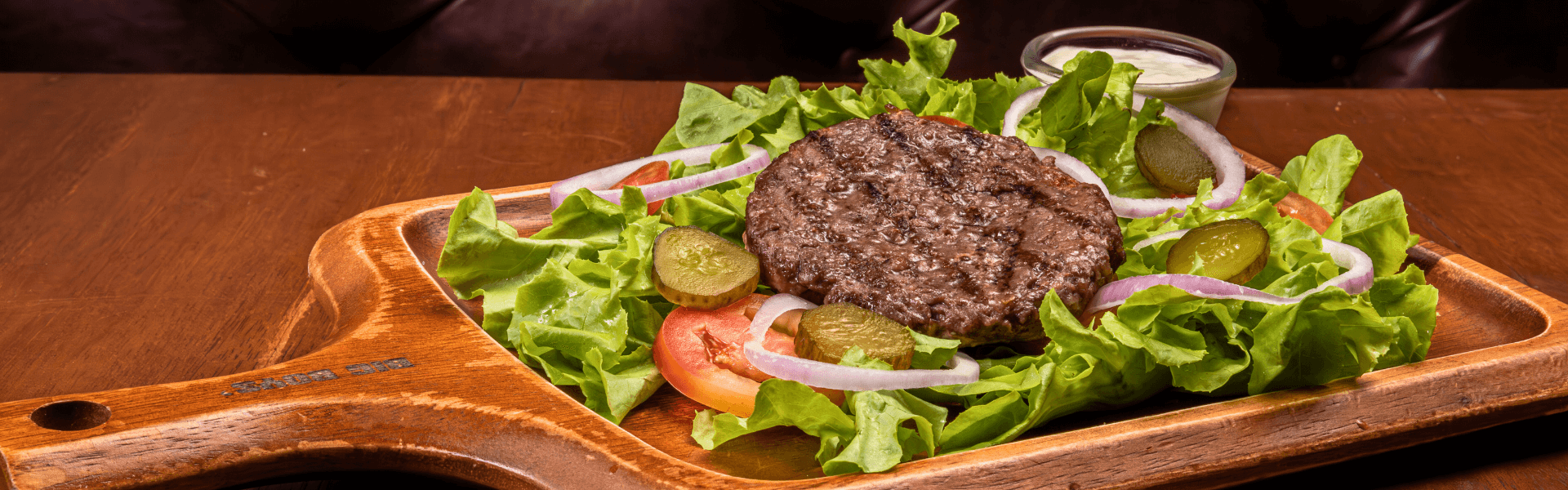 Beef patty, on fresh salad, served at Big Boys’ Burger Club in Kamala, Patong and Rawai